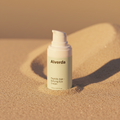 Close-up of Peptide Age-Defying Eye Cream in warm light